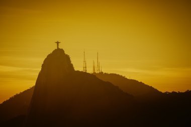 Christ Redeemer silhouette in Rio de Janeiro clipart