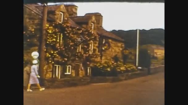 United Kingdom 1965, People stroll in the English village 4 — Stock Video
