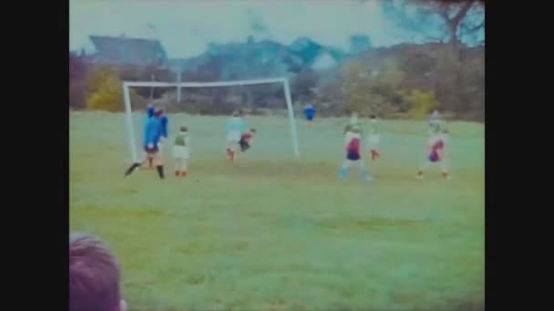 United Kingdom 1965, Children plays football — Stock Video