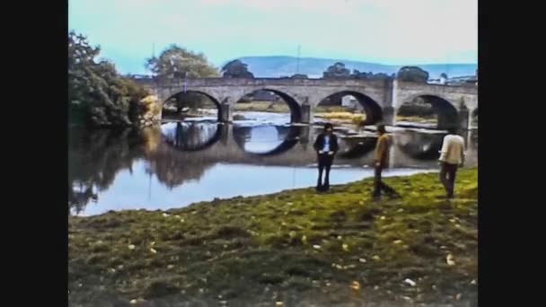 United Kingdom 1968, Old stone bridge over the river — Stock Video