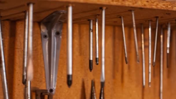 Screwdrivers detail on a shelf — Stock Video