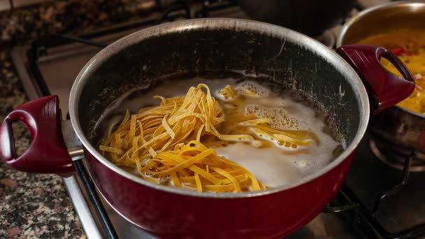 Pasta cooking in the pot — Stock Video