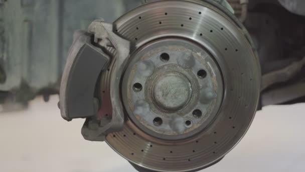 Detail of a worn disc brake ready for replacement — Stock Video