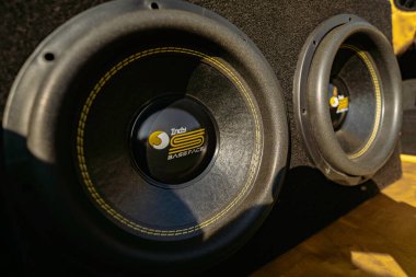 Rome, italy 10 september 2025: car subwoofers mounted in a sealed enclosure pumping deep, powerful bass for high-performance car audio and music listening