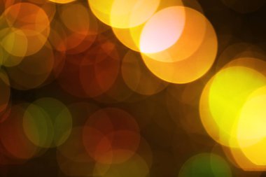 Soyut bulanık renkli Bokeh ışıkları arka plan. Odaklanmamış simli ışık.