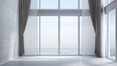 Oturma odası alanı ve mobilyaların iç tasarımı ve beton duvar dokusu arka planı ve deniz manzarası.