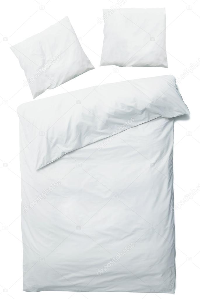 White blanket and pillows