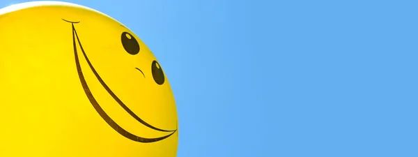 Smiling balloon in the sky — Stock Photo, Image