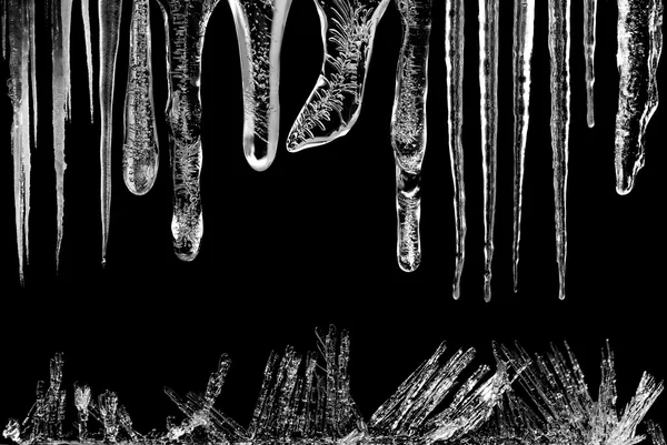 Icicles on Black Background — Stock Photo, Image