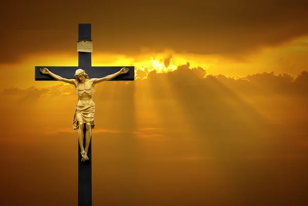 Jesus Christ on the cross over sunrise background — Stock Photo, Image