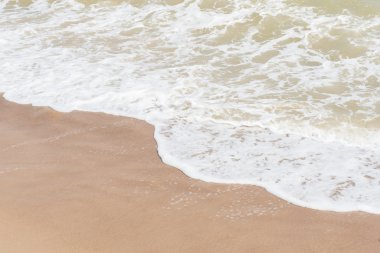 arka plan beyaz kum ile dalga yeşil okyanus