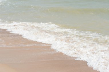 arka plan beyaz kum ile dalga yeşil okyanus