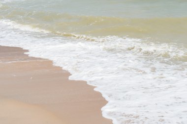 arka plan beyaz kum ile dalga yeşil okyanus