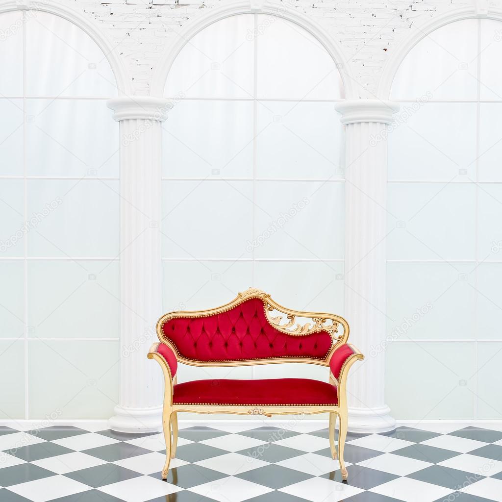 red leather chair in the white room