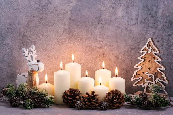 Christmas Background Burning Candles Tree Cone — Stock Photo, Image