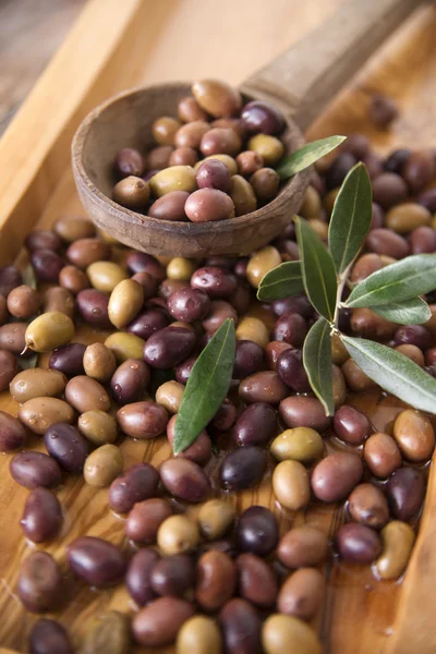 Mixed olives in brine — Stock Photo, Image