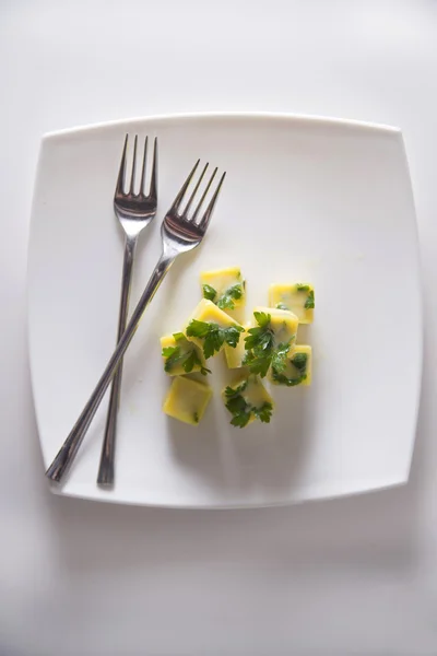 Oil cube frozen with parsley — Stock Photo, Image