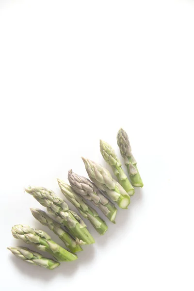 Raw asparagus tips — Stock Photo, Image