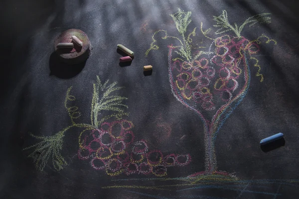 Glass with red grapes — Stock Photo, Image