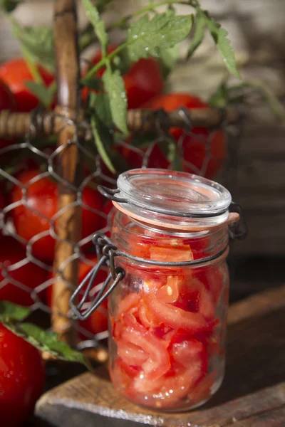 Jar of tomato pieces — Stock Photo, Image