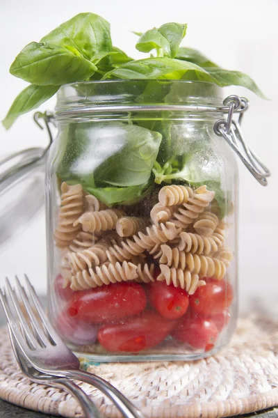 Pasta with tomato sauce and basil — Stock Photo, Image