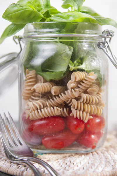 Pasta with tomato sauce and basil — Stock Photo, Image