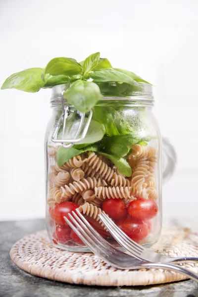 Pasta with tomato sauce and basil — Stock Photo, Image