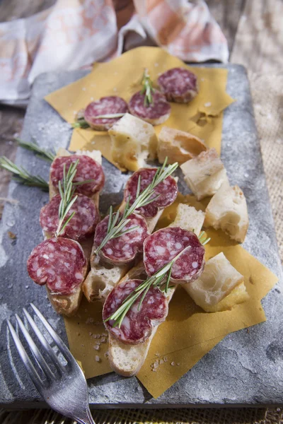 Focaccia and salami — Stock Photo, Image