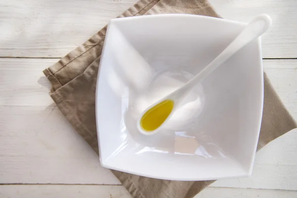 Small containers with extra virgin olive oil — Stock Photo, Image