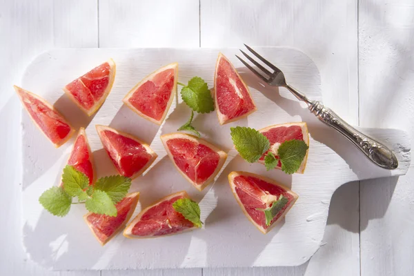 Slices of red grapefruit — Stock Photo, Image