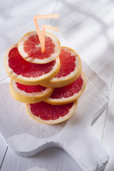 Segmenten van rode grapefruit — Stockfoto