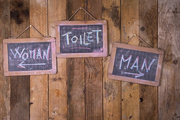 Туалет для жінок і чоловіків — стокове фото