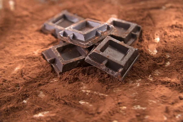 Cubes of dark chocolate — Stock Photo, Image