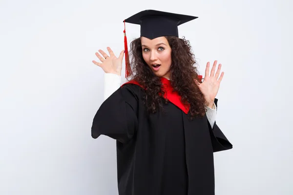 Vrouwelijke student in afstuderen jurk — Stockfoto