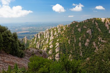 Montserrat is a mountain near Barcelona, in Catalonia clipart
