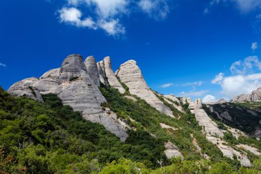 Montserrat is a mountain near Barcelona, in Catalonia clipart