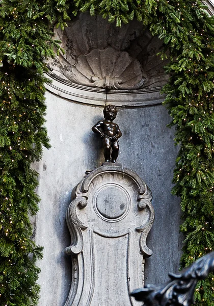 BRUSSELS, BELGIUM - JAN 5: The famous Manneken Pis in central ar