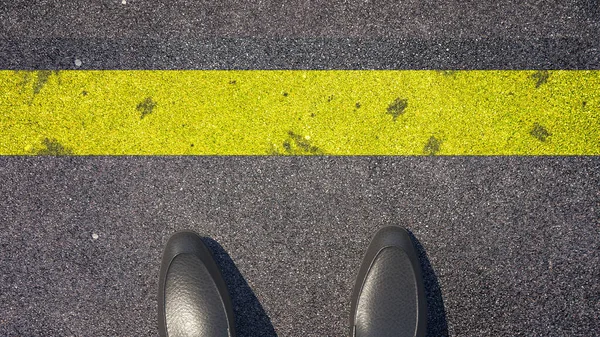 Cross the yellow line ? A person in front of the line. Concept illustration showing shoes in front of a yellow line. 3D Render