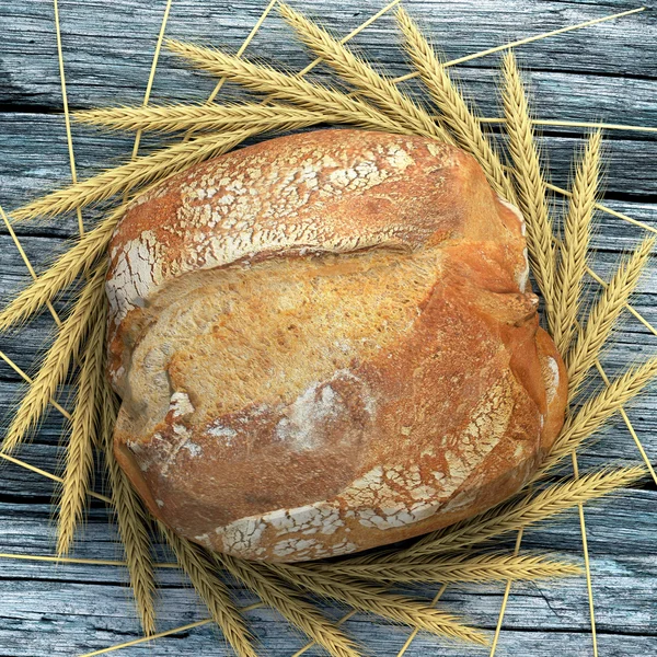 Uma campanha de pão em uma mesa de madeira cercada por espigas de trigo . Fotos De Bancos De Imagens