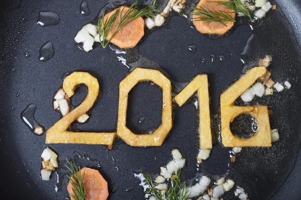 Nový rok symbolem smažené na pánvi — Stock fotografie