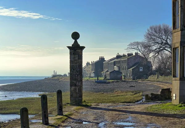 Uma vista ao longo do Segundo Terraço, na aldeia de Sunderland Point Imagens De Bancos De Imagens Sem Royalties