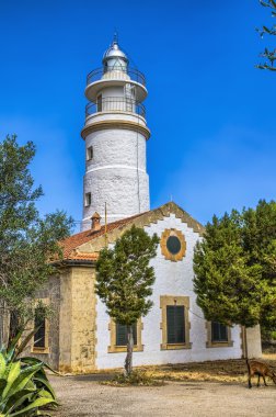 Lighthouse at Port de Soller in Majorca clipart