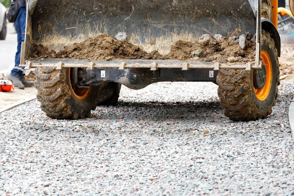 Construction Grader Bucket Construction Site Background Compacted Rubble Sidewalk Construction — Stock Photo, Image