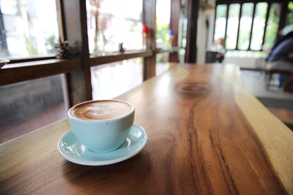 A cup of cappuccino coffee — Stock Photo, Image