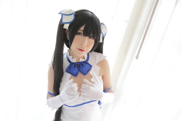 白のテーマにヘスティア コスプレ ポートレート少女 — ストック写真