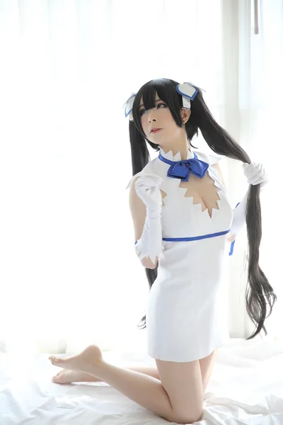 Hestia Cosplay retrato menina em tema branco — Fotografia de Stock