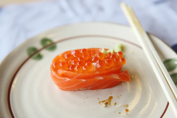 Salmon sushi roll and caviar japanese food — Stock Photo, Image