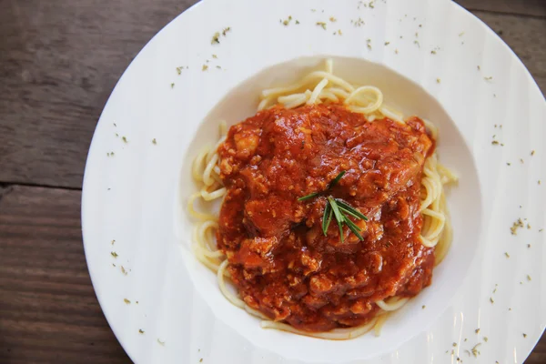 Spaghetti bolognese on wood background — Stock Photo, Image