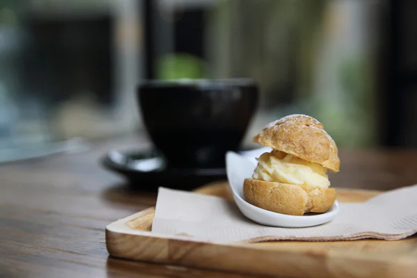 Cream puff choux cream in close up — Stock Photo, Image