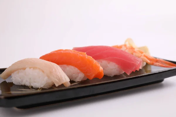 Set Sushi Comida Japonesa Sushi Salmón Atún Camarones Lubina Aislados —  Fotos de Stock